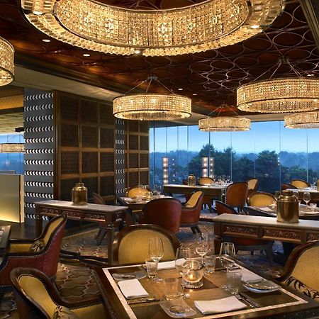 The Leela Ambience Gurugram Hotel & Residences - The Luxury Urban Sanctuary Ґурґаон Ресторан фото The interior of the restaurant